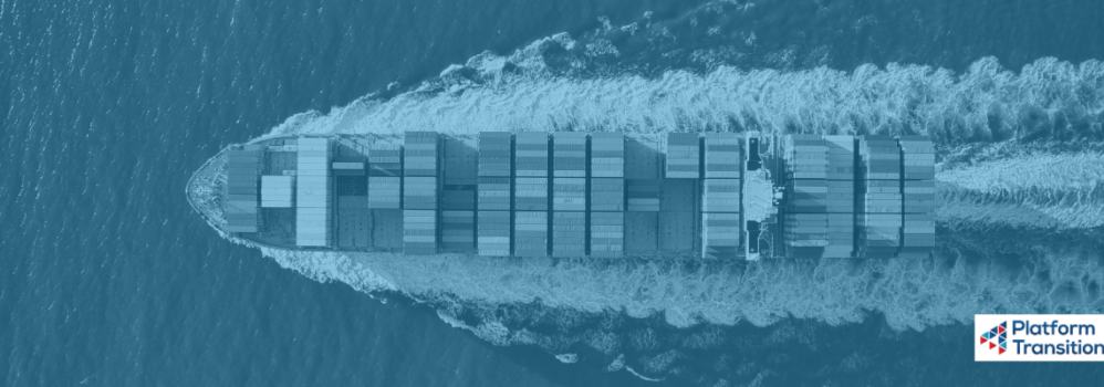 Overhead view of a cargo ship sailing in the ocean